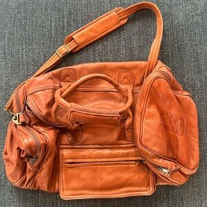 Canyon Outback Leather Duffle Bag - Greater Milwaukee Open